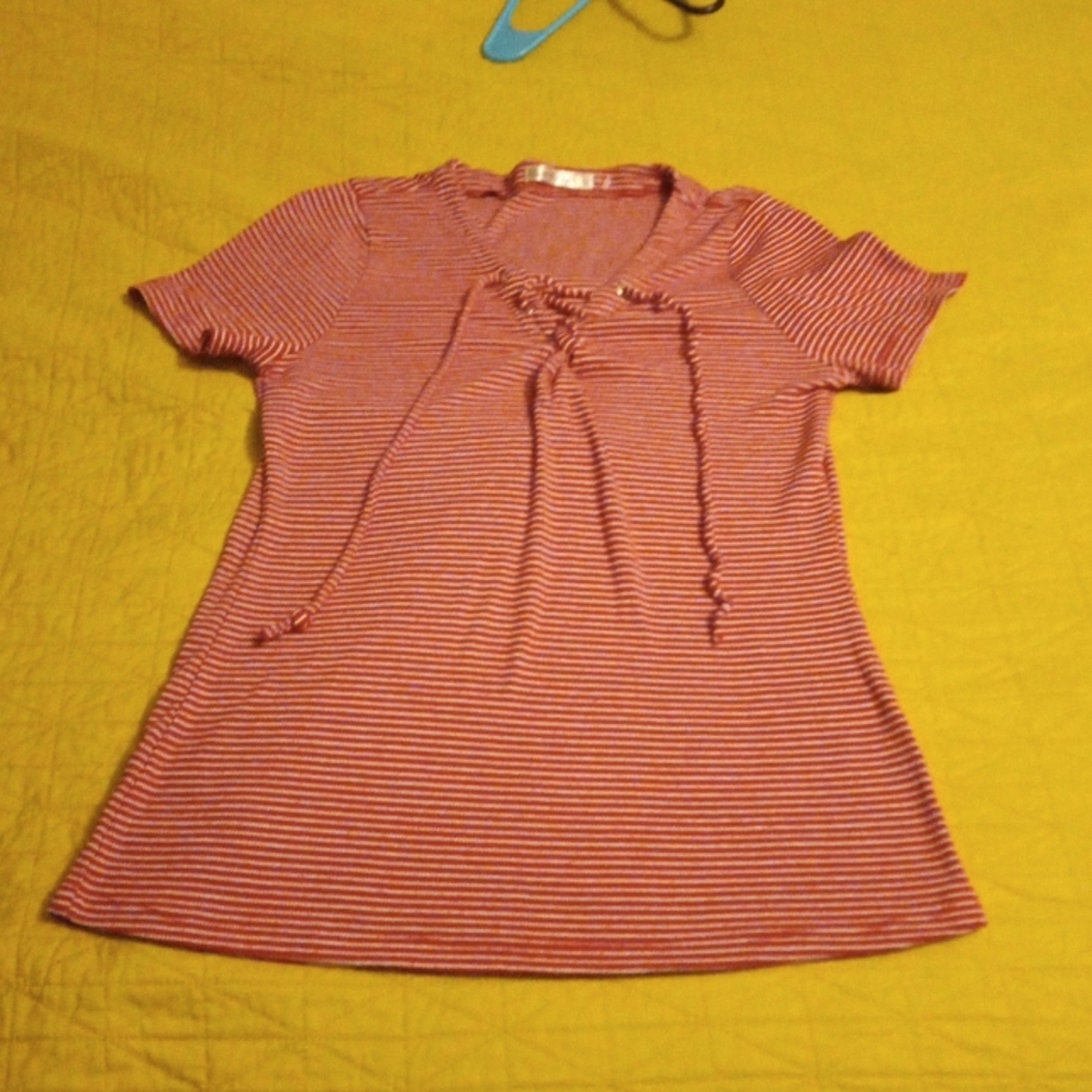 Heart hips red and white shirt draw string in the front.  Never worn